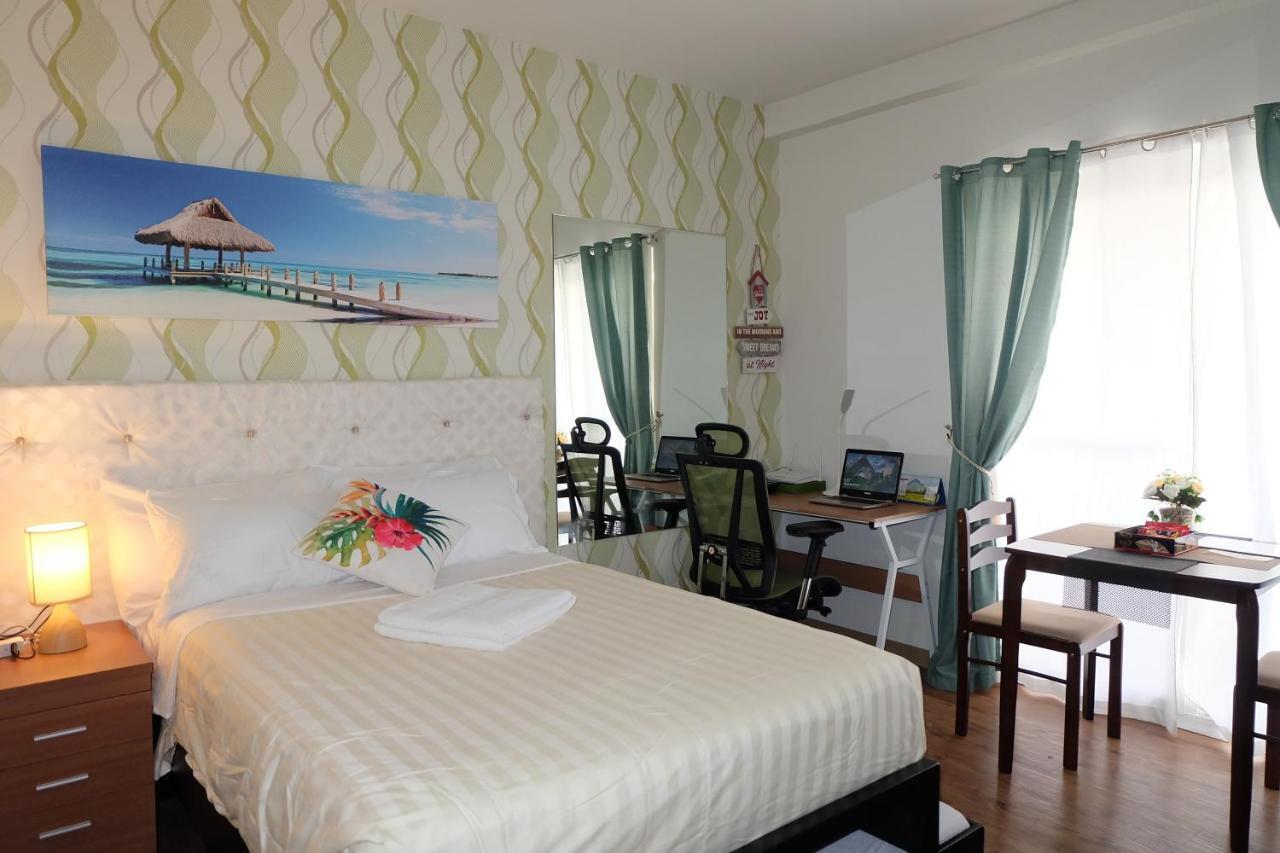 Stay And Fly At Amani Grand Resort Residences マクタン エクステリア 写真